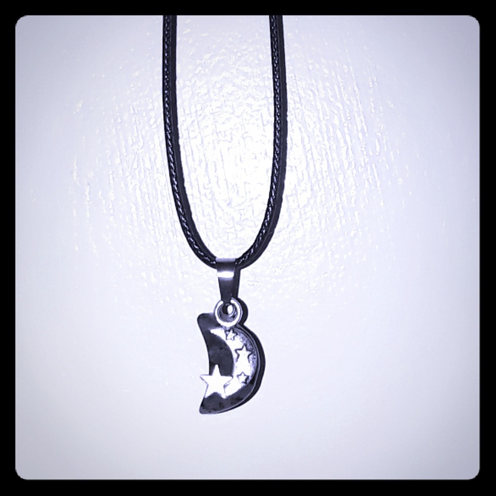 Double Moon pendant on 18in cord with clasps